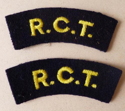 Pair of Royal Corps of Transport 'R.C.T.' machine-embroidered cloth shoulder titles.