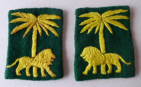 Singapore District matched pair of officers' hand-embroidered shoulder flashes.