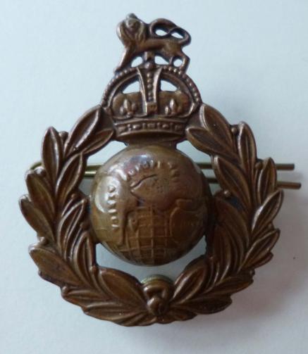 Royal Marines King's crown cap badge.