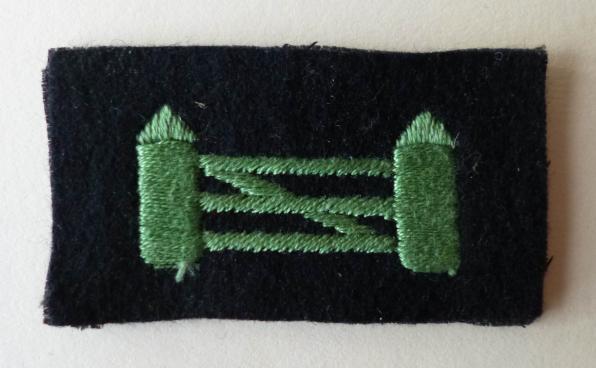 British 6th Corps Machine-embroidered Shoulder-flash.