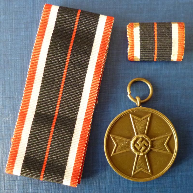 Third Reich : 1939 War Merit Medal (Kriegsverdienstmedaille) with Ribbon-bar.