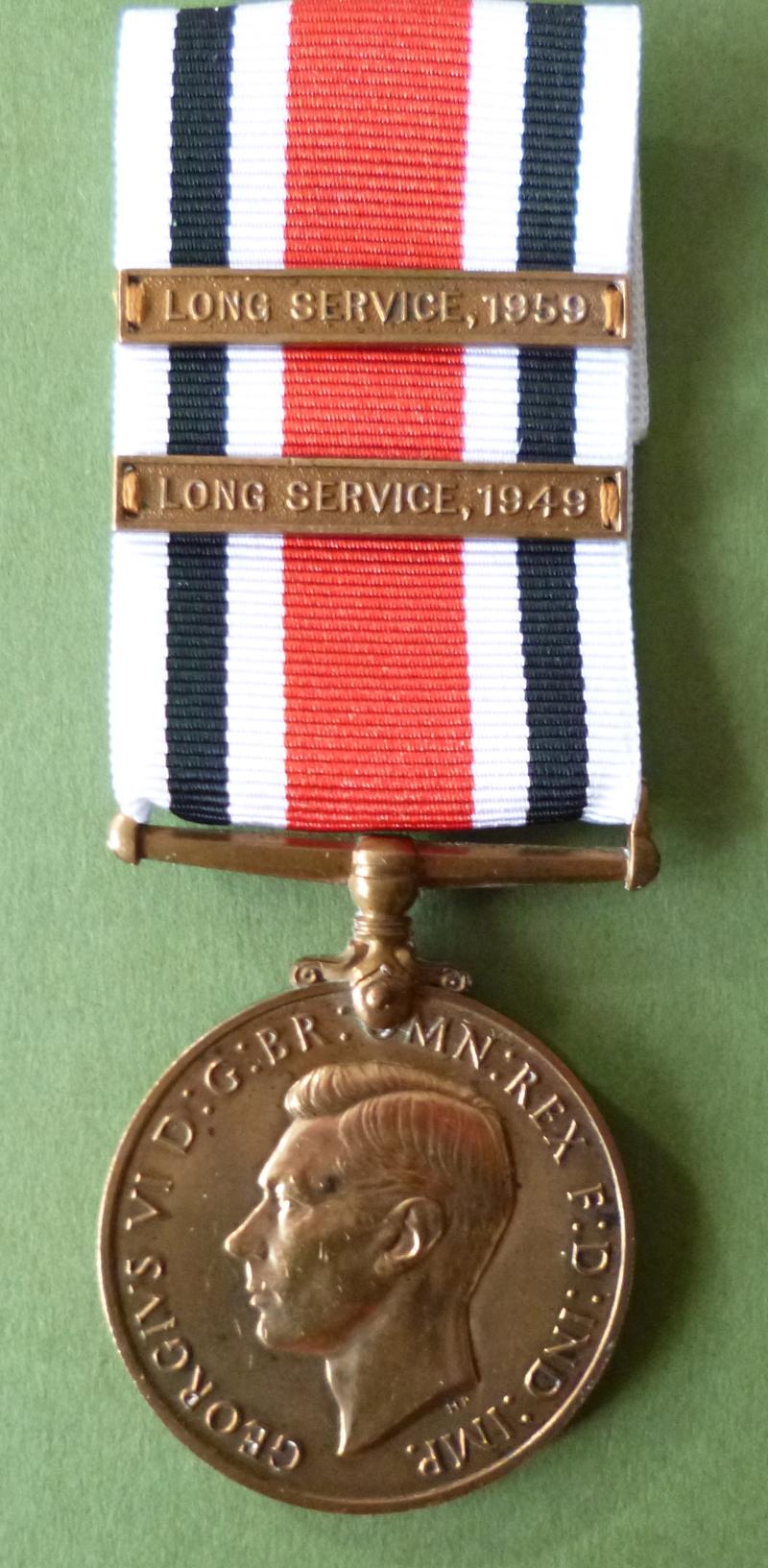 Special Constabulary Long Service Medal (GviR Ind.Imp) with two Long-service Clasps.