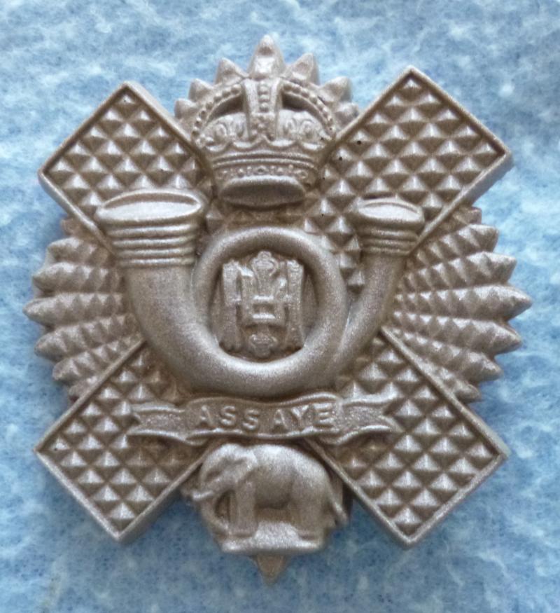 WW2 Highland Light Infantry Plastic War-economy Cap-badge.