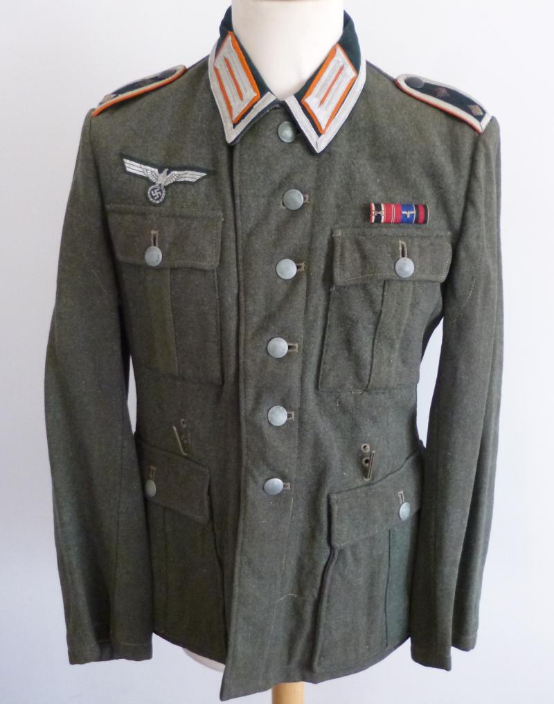 Third Reich : Wehrmacht / Heer (Army) Hauptfeldwebel's M-40 Service-tunic with Orange Arm-of-Service Colour.