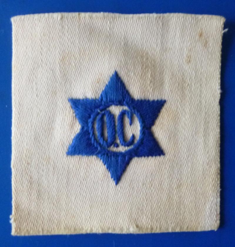 Royal Navy WW2 Officers' Cook 'O.C' Blue-embroidered Arm-badge on White.
