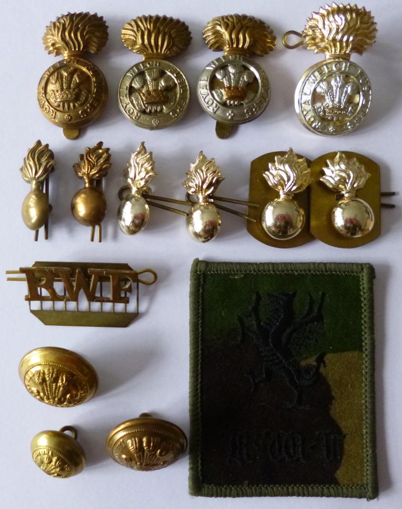 Royal Welch Fusiliers Grouping of Eleven Badges, One TRF & Three Buttons.