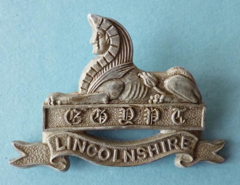 WW2 Lincolnshire Regiment Plastic War-economy Cap-badge.