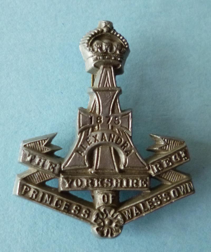 WW2 The Green Howards (Alexandra Princess of Wales' Own Yorkshire Regiment) Plastic War-economy Cap-badge.